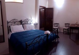A bed or beds in a room at Affittacamere Carpe Diem
