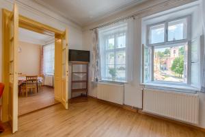 TV a/nebo společenská místnost v ubytování Apartmány Pod starou věží