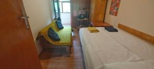 Postel nebo postele na pokoji v ubytování Waterfall Guest House