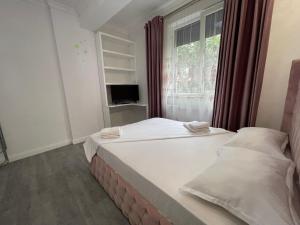 Postel nebo postele na pokoji v ubytování Travelers Rezidential Home