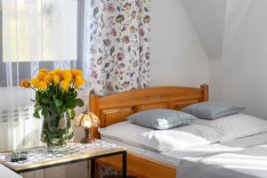 Posteľ alebo postele v izbe v ubytovaní Apartament u Kostka