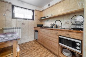 Kuchyňa alebo kuchynka v ubytovaní Apartament u Kostka