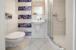 Kúpeľňa v ubytovaní Apartament u Kostka + 37 fotografií
