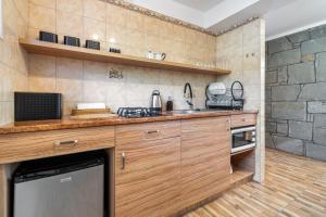 Kuchyňa alebo kuchynka v ubytovaní Apartament u Kostka