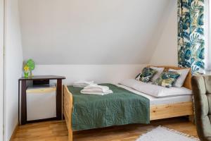 Posteľ alebo postele v izbe v ubytovaní Apartament u Kostka