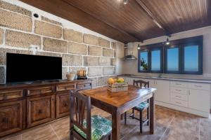 Μια τηλεόραση ή/και κέντρο ψυχαγωγίας στο Casa Eyden By Paramount Holidays