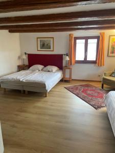 Postel nebo postele na pokoji v ubytování Gîte Nicole proche du Europa Park