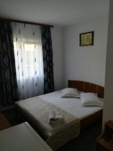 Postel nebo postele na pokoji v ubytování vila CALIL