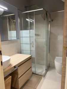 A bathroom at Porto Coda Cavallo Salina Bamba