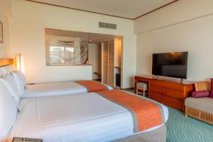 Postel nebo postele na pokoji v ubytování Hotel Nikko Guam