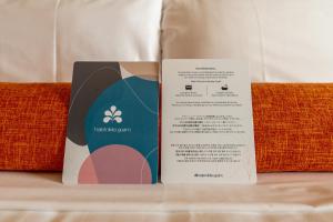 Postel nebo postele na pokoji v ubytování Hotel Nikko Guam