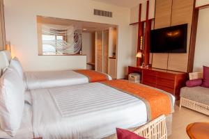 Postel nebo postele na pokoji v ubytování Hotel Nikko Guam