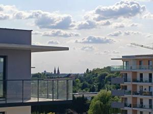 a view of a city from a building at Apartament Malina in Kutno