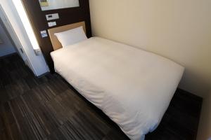 Postel nebo postele na pokoji v ubytování Washington R&BHotel TokyoToyocho