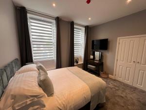 The Globe Apartments客房内的一张或多张床位