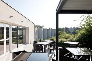 Balkón nebo terasa v ubytování Hôtel Le Riccoty