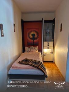 Postel nebo postele na pokoji v ubytování Ferienbutzen Harz Heikenberg, Bad Lauterberg mit Schwimmbad und Sauna