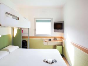 Postel nebo postele na pokoji v ubytování ibis budget Beaconsfield