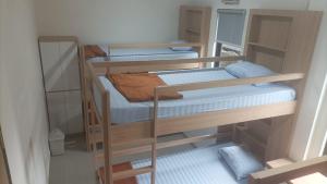 Postel nebo postele na pokoji v ubytování Ngaso Ing Salatiga