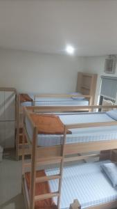 Postel nebo postele na pokoji v ubytování Ngaso Ing Salatiga