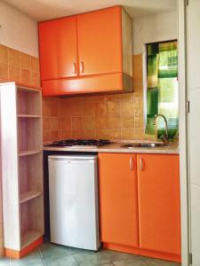 Kuchyň nebo kuchyňský kout v ubytování Residence Arco delle Rose