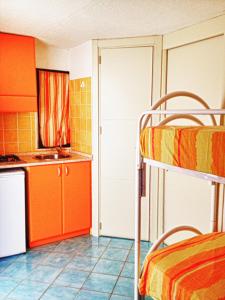 Kuchyň nebo kuchyňský kout v ubytování Residence Arco delle Rose
