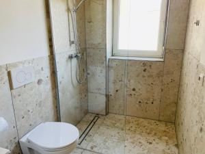 Koupelna v ubytování Ferienwohnung Angelika Gries + 9 fotografií