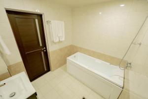 Vannituba majutusasutuses Welcome Inn Hotel