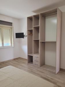 Postel nebo postele na pokoji v ubytování HOUSE AIRPORT Catania