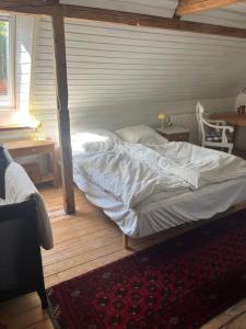 Postel nebo postele na pokoji v ubytování Roligt Landhus