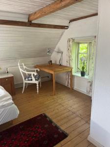 Postel nebo postele na pokoji v ubytování Roligt Landhus