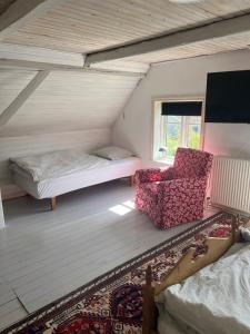 Postel nebo postele na pokoji v ubytování Roligt Landhus