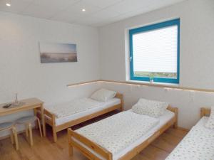 Postel nebo postele na pokoji v ubytování Gästehaus Kristall