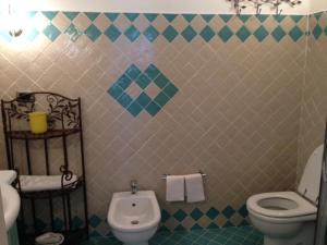 A bathroom at Appartamento Caty