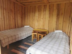Postel nebo postele na pokoji v ubytování Päikesekivi Keskus