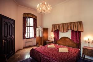 Postel nebo postele na pokoji v ubytování Hotel Štekl