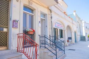 a building with stairs on the side of it at Casa Bottazzi in Diso