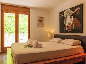 Postel nebo postele na pokoji v ubytování Apartment Grand Panorama B3 by Interhome