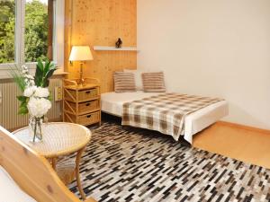 Ένα ή περισσότερα κρεβάτια σε δωμάτιο στο Apartment Belmont Ouest 75 by Interhome