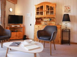Μια τηλεόραση ή/και κέντρο ψυχαγωγίας στο Apartment Belmont Ouest 75 by Interhome +25 φωτογραφίες
