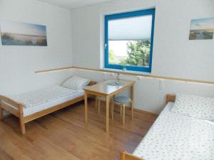 Postel nebo postele na pokoji v ubytování Gästehaus Kristall