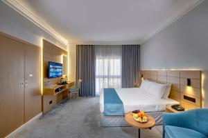 تلفاز و/أو أجهزة ترفيهية في Lotus Grand Hotel
