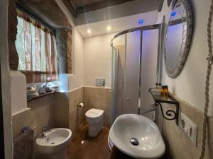 Koupelna v ubytování Terrazza sul Tufo