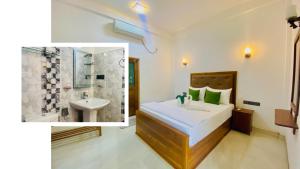bagno con letto, doccia e lavandino di Perfect Hideout a Dambulla