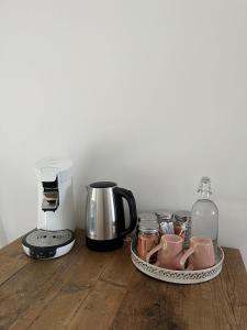 Příslušenství pro přípravu čaje a kávy v ubytování Habitat