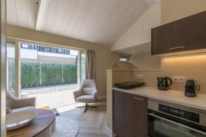 Kuchyň nebo kuchyňský kout v ubytování Strandsuites Callantsoog + 11 fotografií