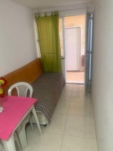 Postel nebo postele na pokoji v ubytování Pousada dos amigos + 11 fotografií