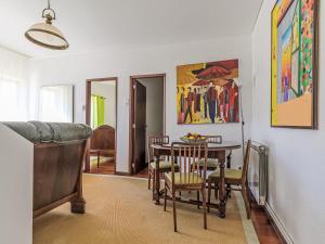 a dining room with a table and chairs at Holiday Home Do Condado by Interhome in Caminha