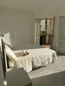 Postel nebo postele na pokoji v ubytování Casa Morgetia
