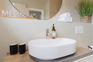 Ein Badezimmer in der Unterkunft Seetiid